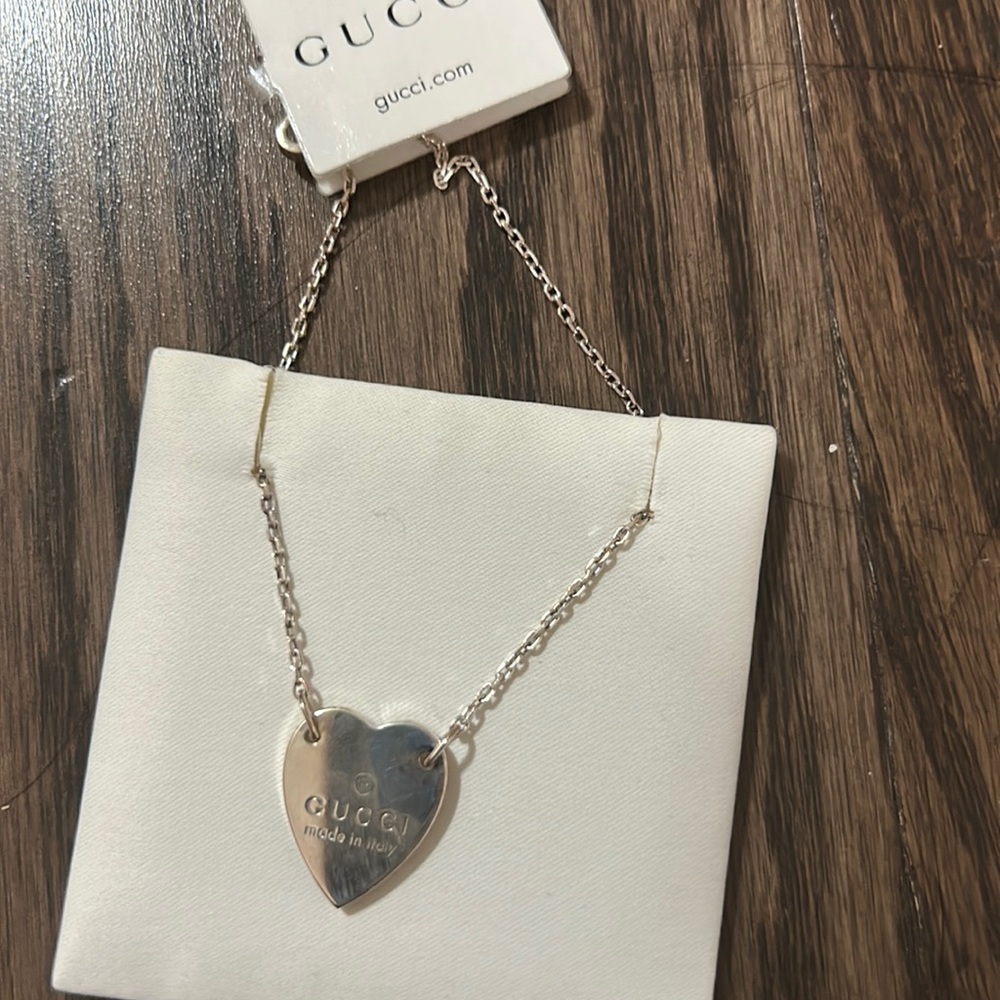 Gucci heart necklace- see the pictures for the condition